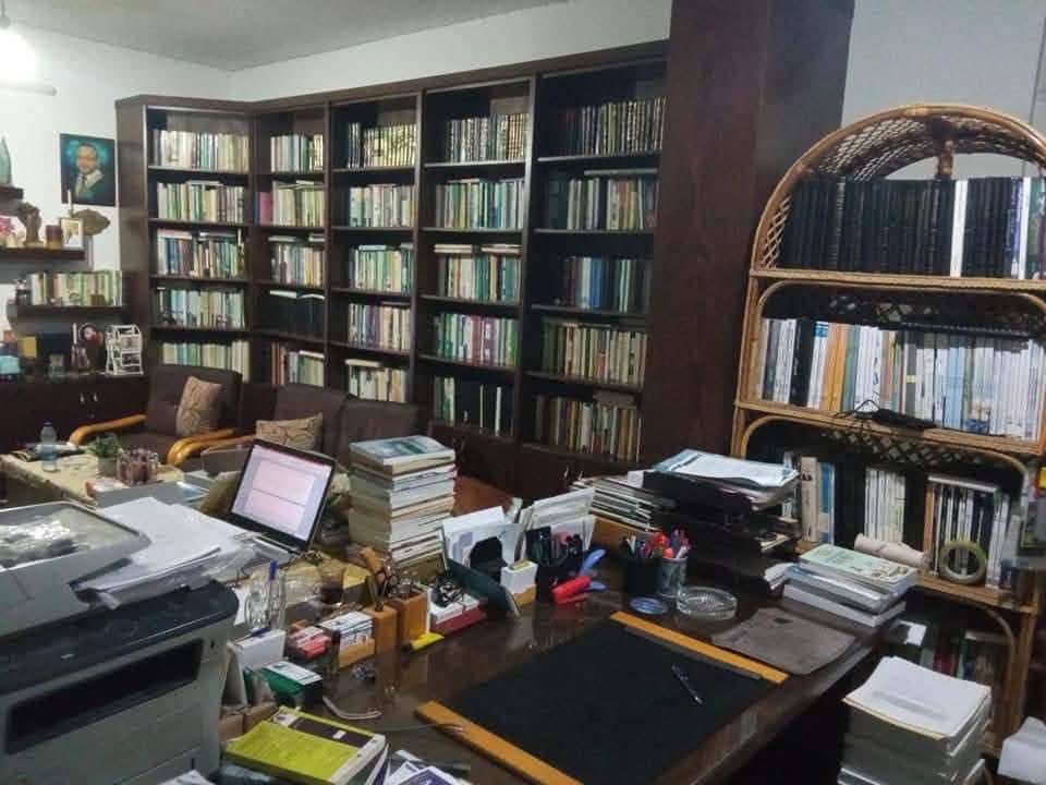 Dr Mahmoud Assaf Sells His Books to Light a Fire