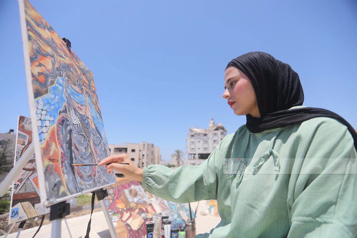 Gaza Artist Paints From Rooftop of Destroyed Home
