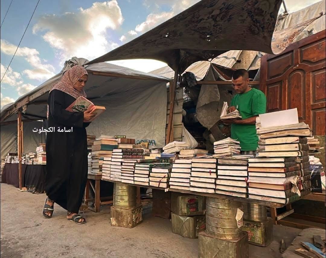 Woman Rescues Books From Gaza Ruins